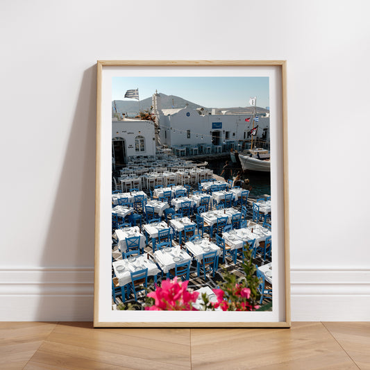 Greece Fine Art Prints of an outdoor taverna on Naoussa boat harbour on the island of Paros. Portrait orientation. By Brooke Darling Photography.