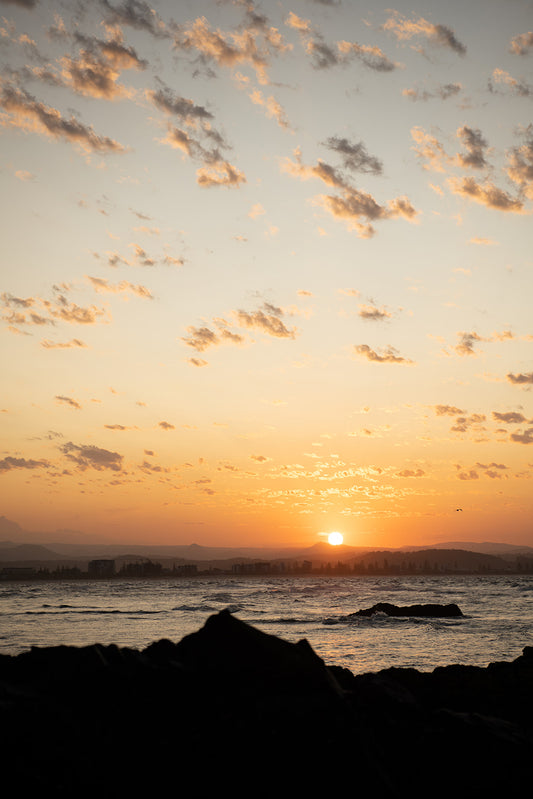 Coastal Australian fine art photography prints of warm sunsets over Coolangatta and Rainbow Beach. Australian wall art prints.