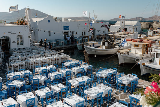 Naoussa boat harbour with tavernas on the island of Paros, available as Greece fine art prints.