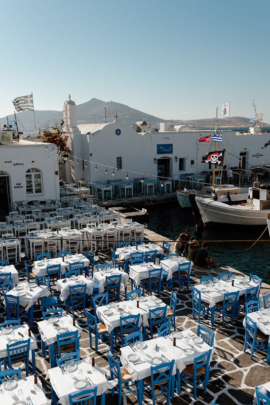 Greek wall art prints featuring the popular boat harbour of Naoussa in Paros. Bring Greek Islands fine art into your home or special space.