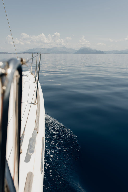 Framed photograph of a sailboat on the water. Sailing Boat Fine Art Prints to bring the feeling of adventure into your home. Sailing Boat Wall Art.