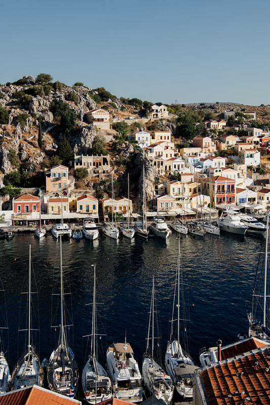 Symi Boat Harbour. Bring Greek Island fine art prints into your home or retreat and dream about life adrift on the Mediterranean Sea. Greek Island Fine Art Prints.