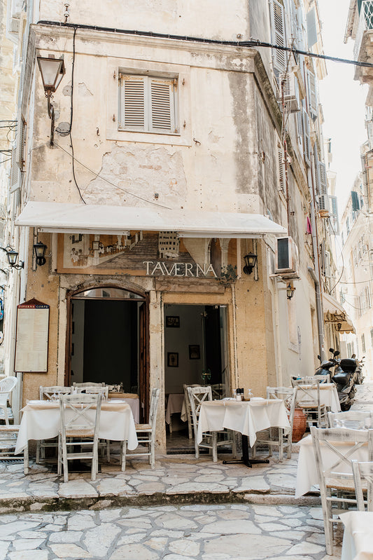 Framed photograph of a Taverna restaurant exterior with outdoor seating. CORFU OLD TOWN, IONIAN ISLANDS, GREECE. SHOP Greece Fine Art Photography Prints. With premium printing and framing, enjoy your investment for years to come.