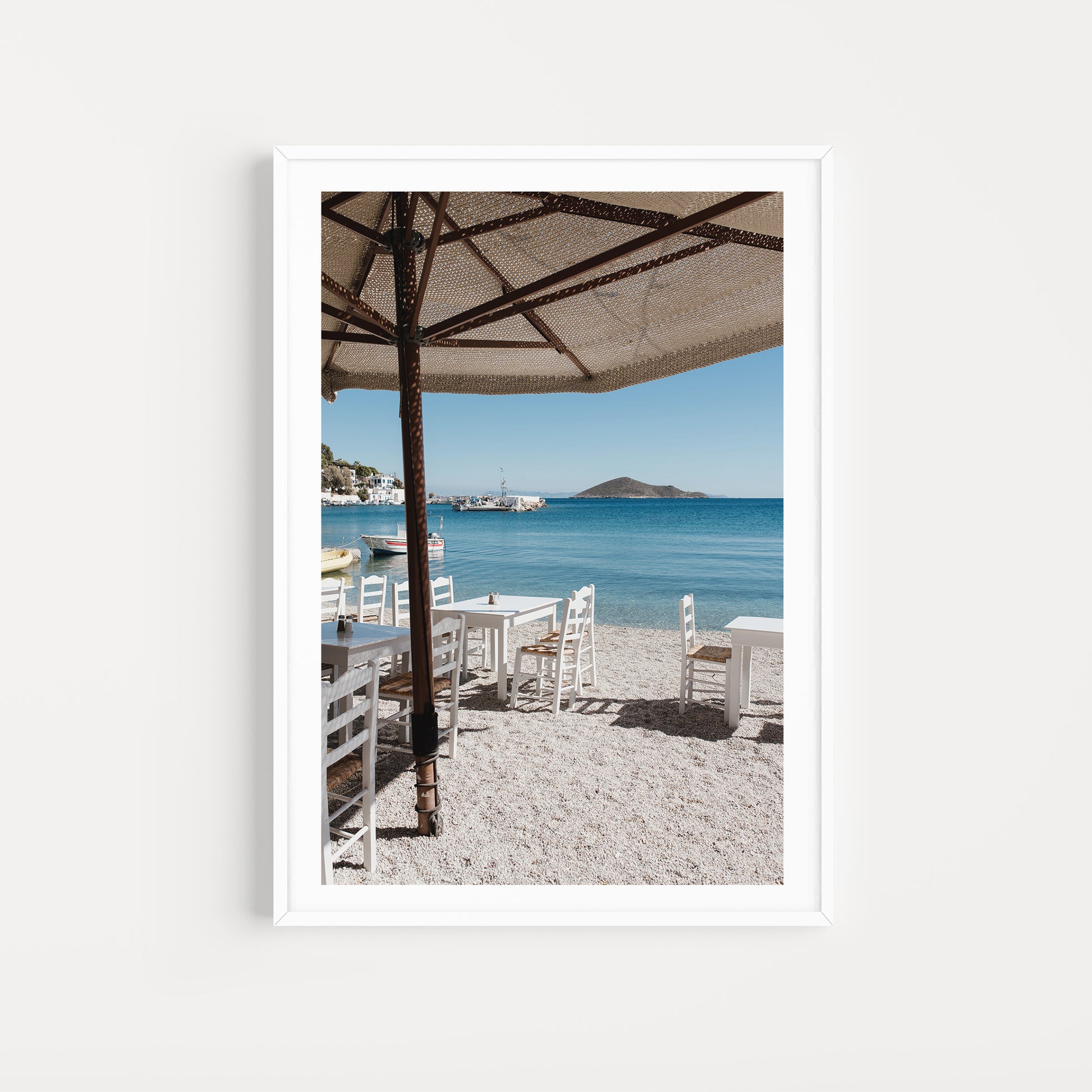 Greece fine art prints featuring a simple Greek taverna in the sunshine on the Greek Island of Leros. 