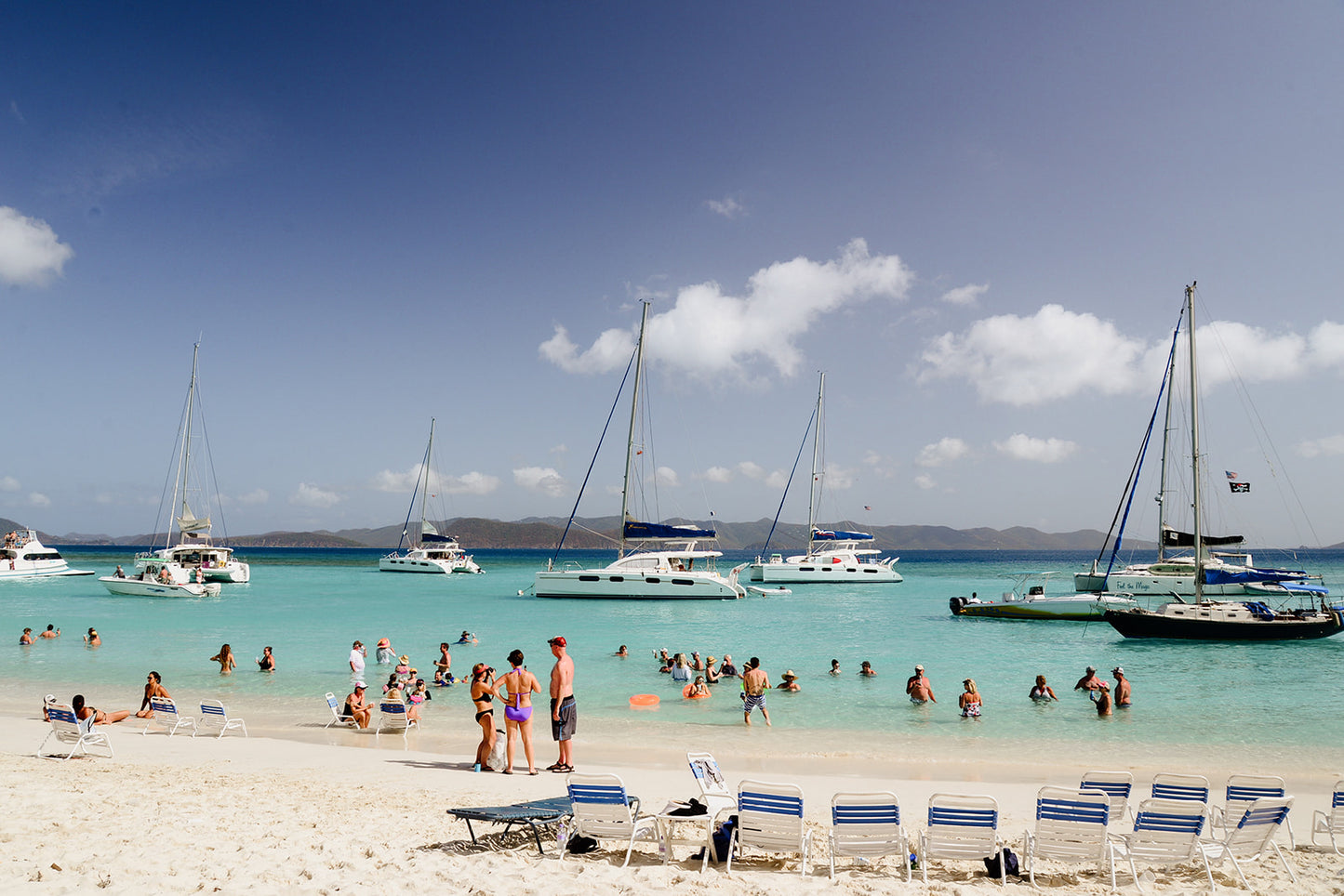 Beach scene with people, boats, and lounge chairs under a blue sky. JOST VAN DYKE, BRITISH VIRGIN ISLANDS, CARIBBEAN British Virgin Islands Wall Art Print Fine art travel prints are custom printed and framed to order.