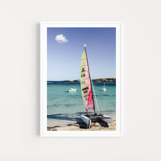 Hobby cat on the beach. Bring European Summer colour and energy into your home with Formentera Island scenes. Balearic Island Fine Art Prints. High-quality art prints, made to order.
