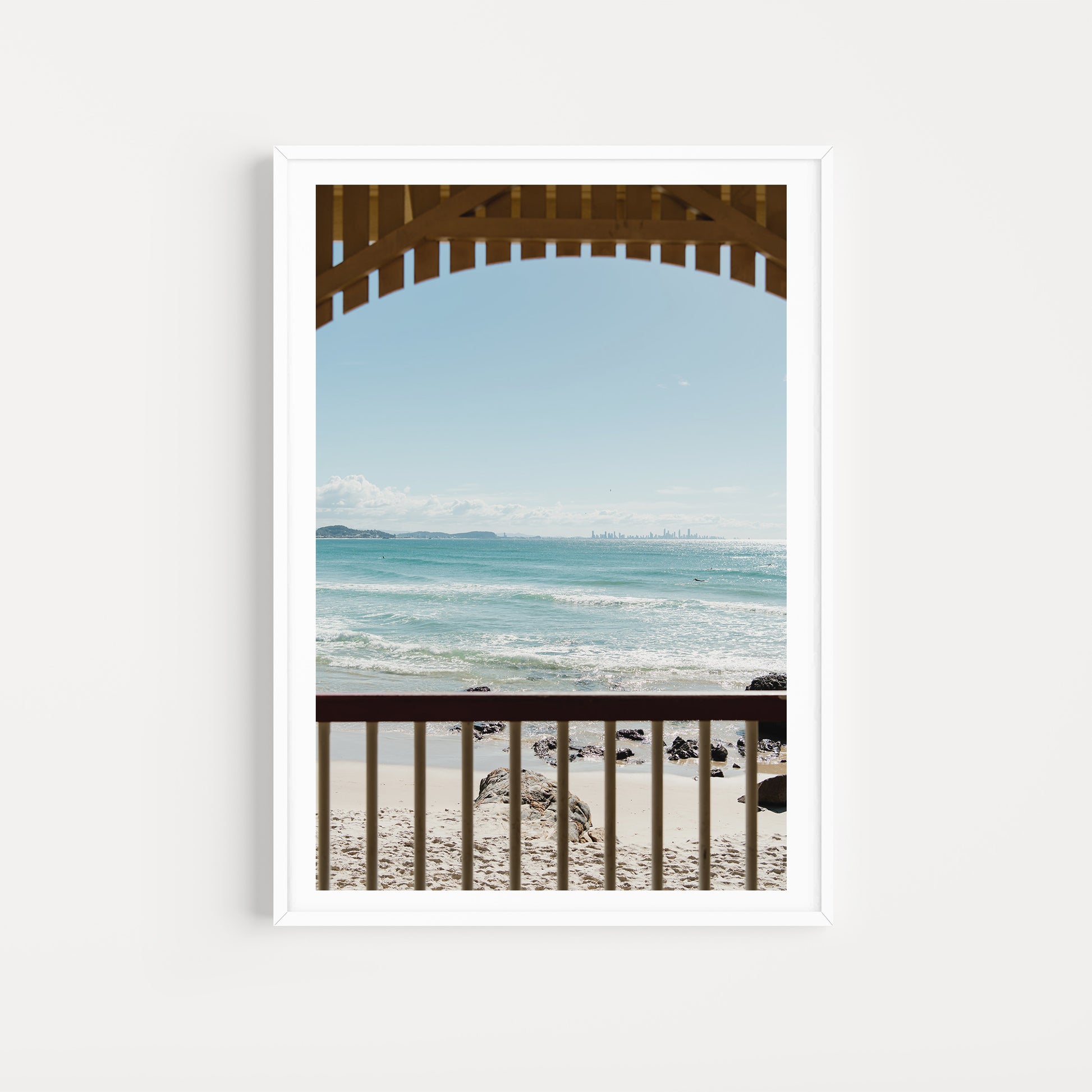 Framed photograph of a beach view with ocean and sky. Australia Coastal Fine Art Photography Prints are custom printed and framed to order on the Gold Coast, Australia. Bring the beach life feeling into your home. 