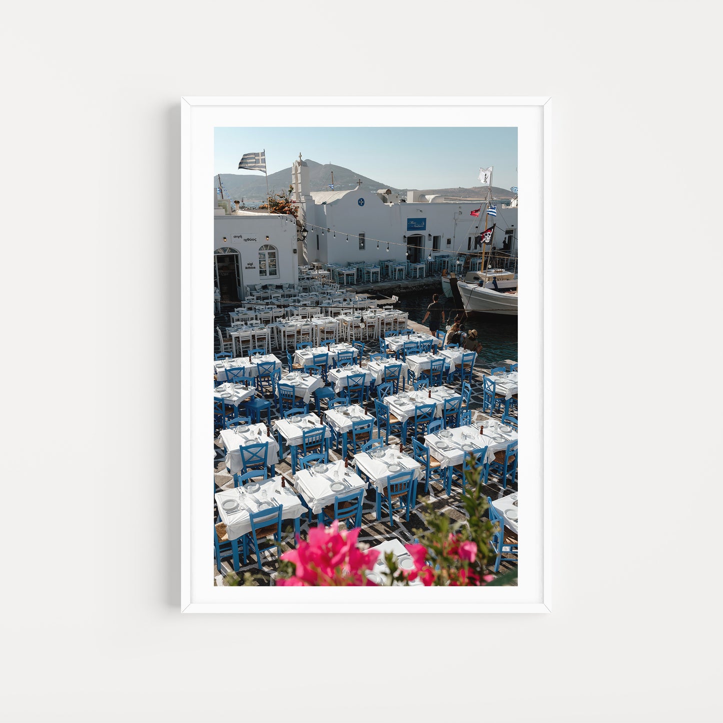 Greece Fine Art Prints of an outdoor taverna on Naoussa boat harbour on the island of Paros. Portrait orientation. By Brooke Darling Photography.