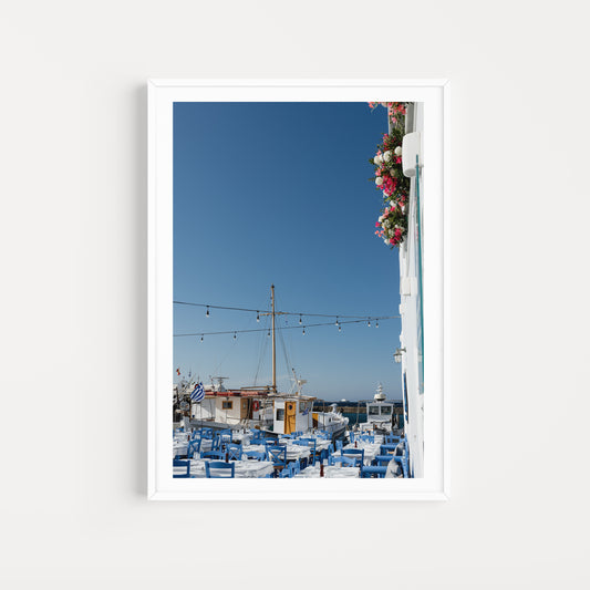 White frame mock up of Naoussa Boat Harbour in Paros Island available as Greece fine art prints.