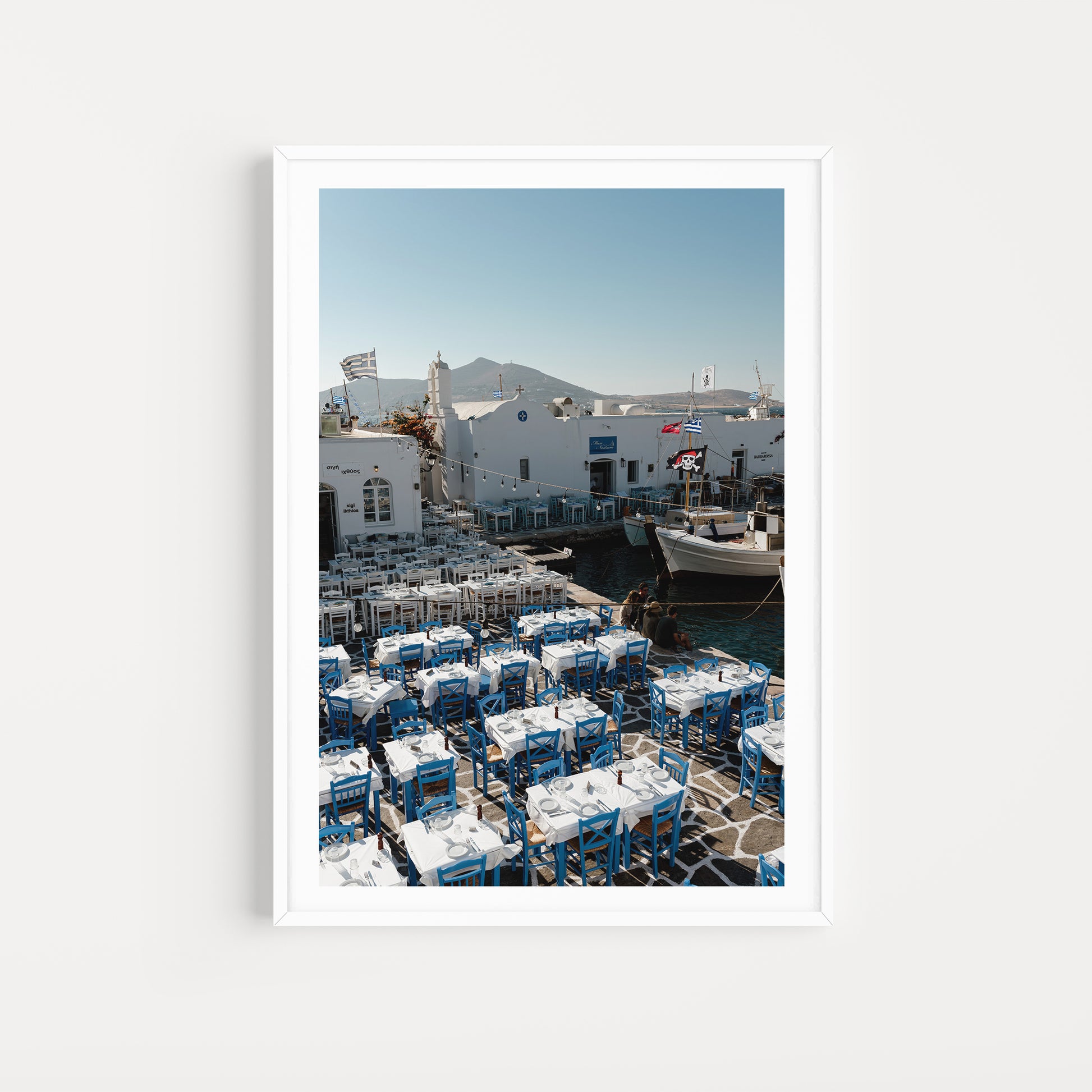 Greek wall art prints featuring the popular boat harbour of Naoussa in Paros. Bring Greek Islands fine art into your home or special space.