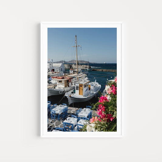 Portrait white frame mock up of famous Naoussa Boat Harbour on Paros Island available at Greece fine art prints for your walls. 