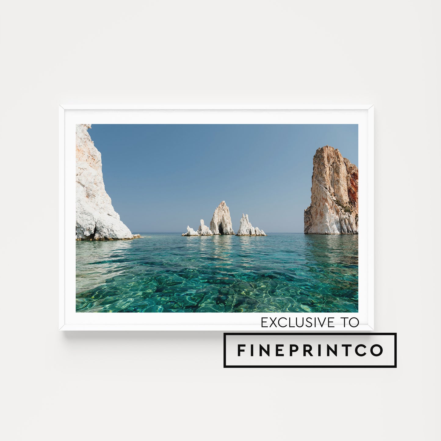 Greek Islands art print showcasing stunning coastal scene with rocky outcrops and clear blue water, exclusive to Fineprintco. Greek Islands art print showcasing vibrant blue landscape image of rocks and ocean at Polyaigos Island near Milos. High quality Greece fine art photographic print.