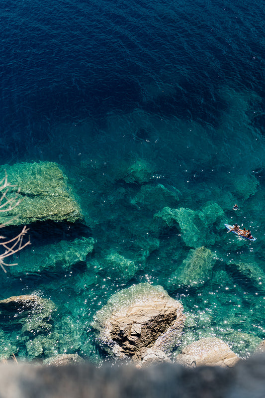 Framed artwork of a blue and green underwater scene with rocks. SKOPELOS, SPORADES, GREECE. Bring Mediterranean summer into your home. Greece Summer Fine Art Prints are custom printed and framed to order. 