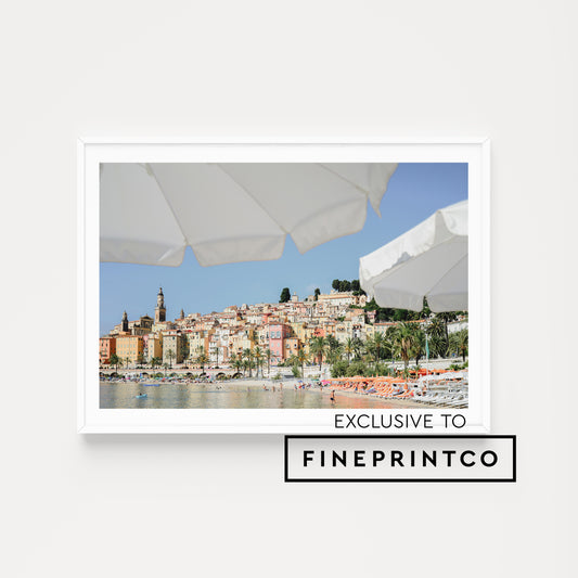 Looking through umbrellas to Menton on the French Riviera, available as French Riviera fine art wall prints.