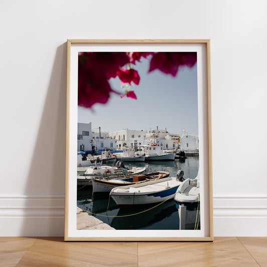 Portrait mock up print of Greek Island fine art print featuring famous Naoussa boat harbour on the island of Paros. 