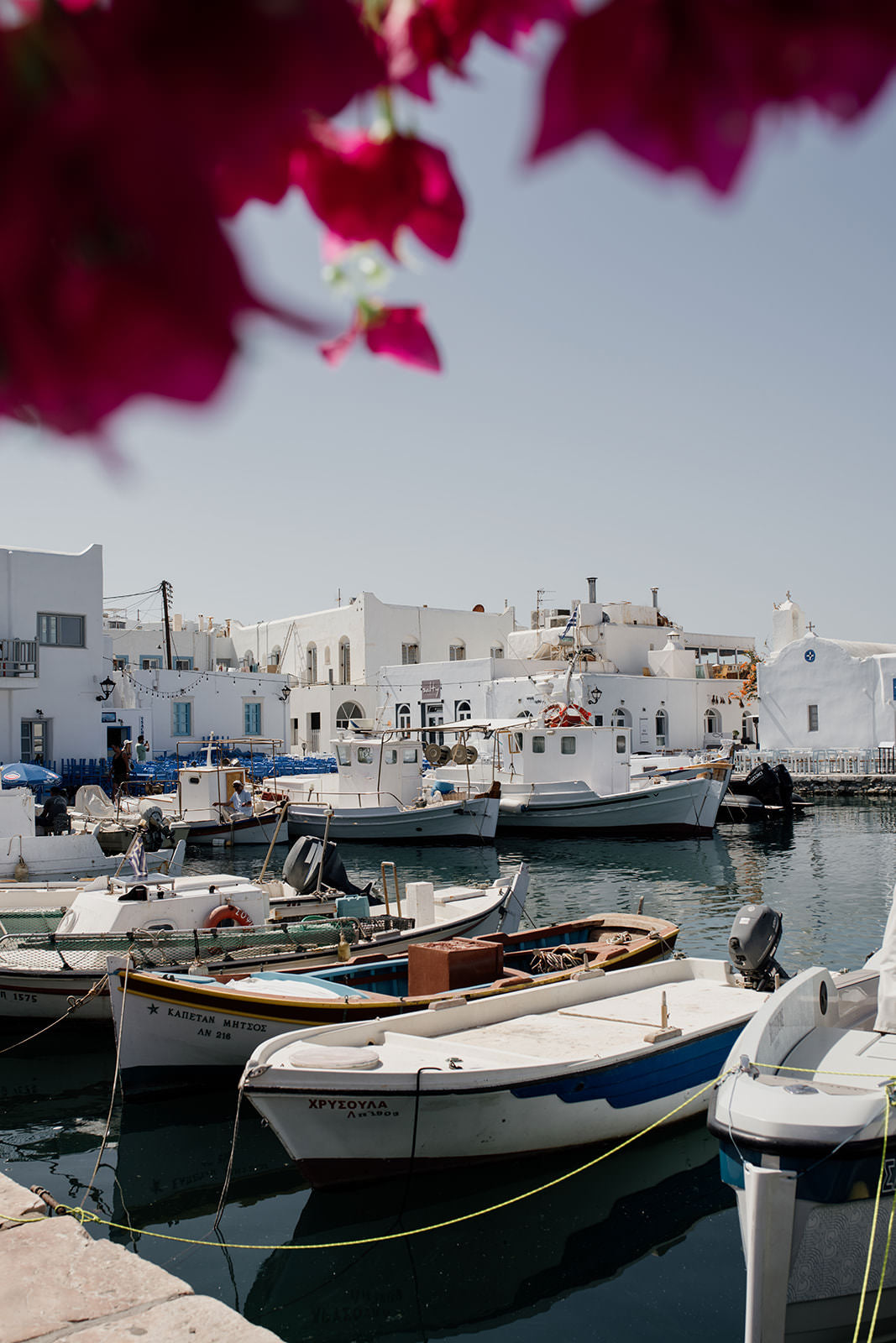 Portrait print of Greek Island fine art print featuring famous Naoussa boat harbour on the island of Paros. 