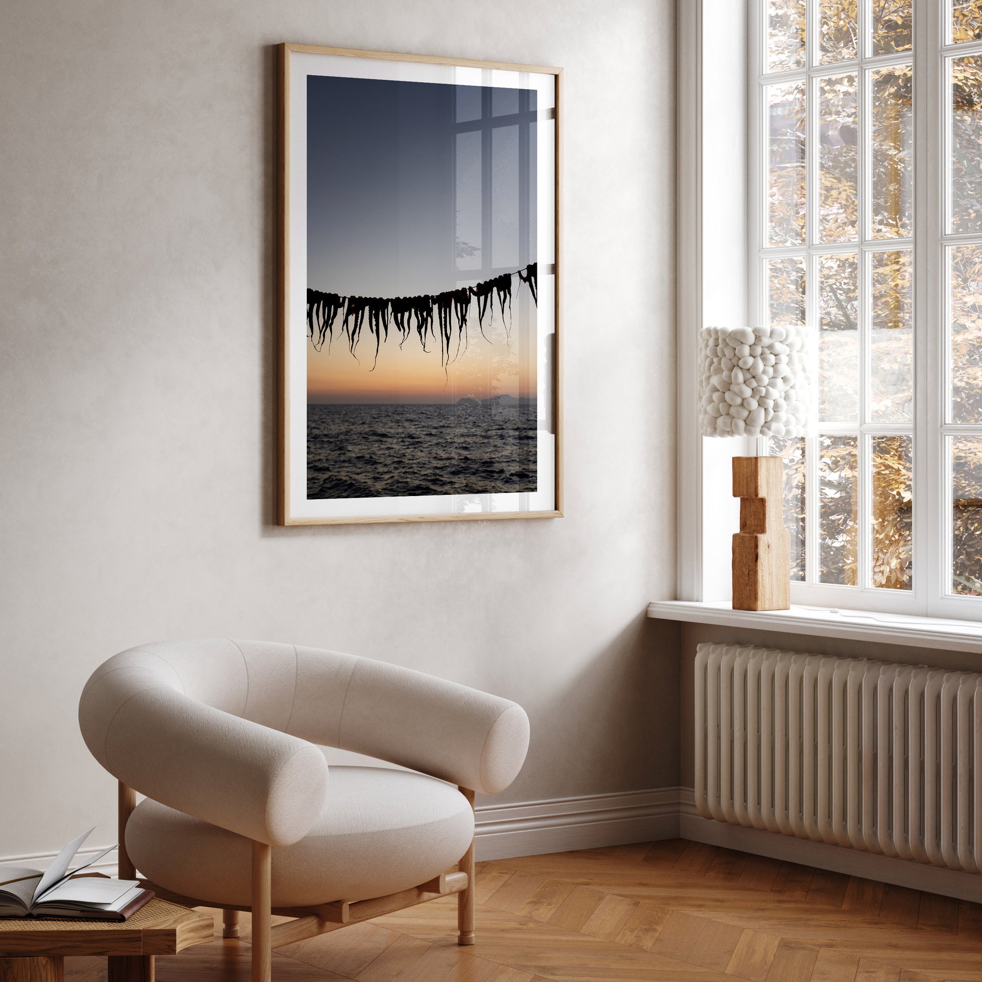 Bring the taste and senses of Greek food into your home with Greek food fine art prints to hang on your walls. Art prints of octopus legs drying at sunset. 