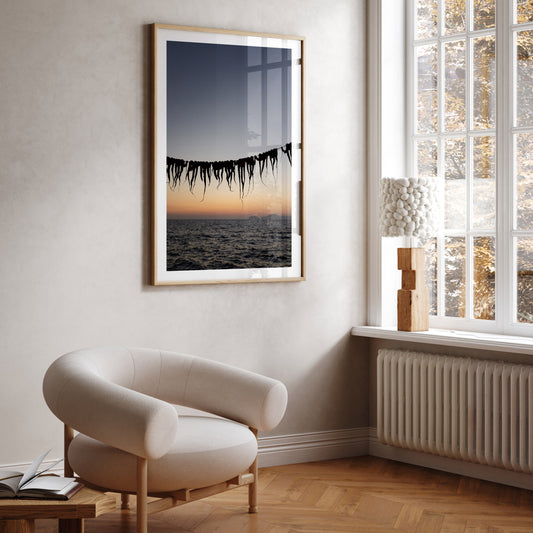 Bring the taste and senses of Greek food into your home with Greek food fine art prints to hang on your walls. Art prints of octopus legs drying at sunset. 