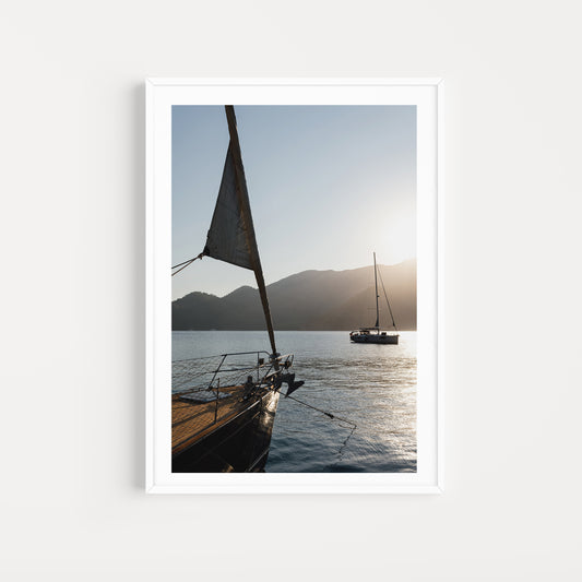 Bring the daydream of sailing into the sunset into your home with sailing boat fine art prints featuring a sunset moor approach at Dalyan, Türkiye. Sailing Art Prints.