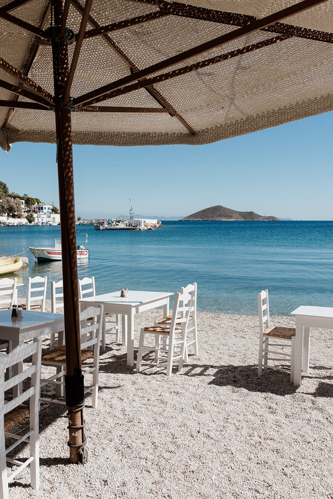 Greece fine art prints featuring a simple Greek taverna in the sunshine on the Greek Island of Leros. 