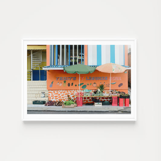 Colorful fruit stand with an orange canopy on a white background. Bring the colour and vibrancy of the Caribbean into your home with tropical framed wall art prints. Tropical Wall Art. Caribbean Fine Art Prints. 